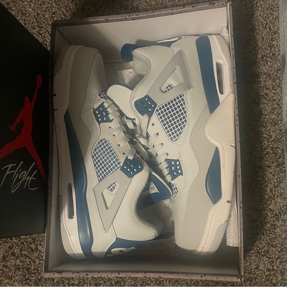 Jordan 4 Retro White and Blue Sneakers